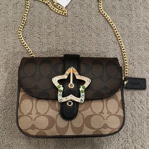 Coach purse with star detailing